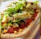 Pizza con mais e verdure miste